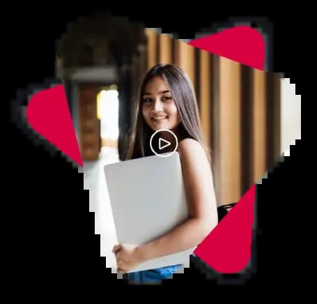 a student of a teacher-training program holding a white laptop