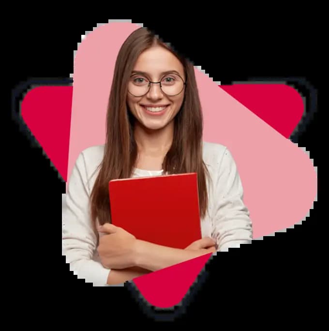 a girl smiling while she holding a orange laptop