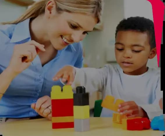 A certified Montessori teacher teaches a student using blocks